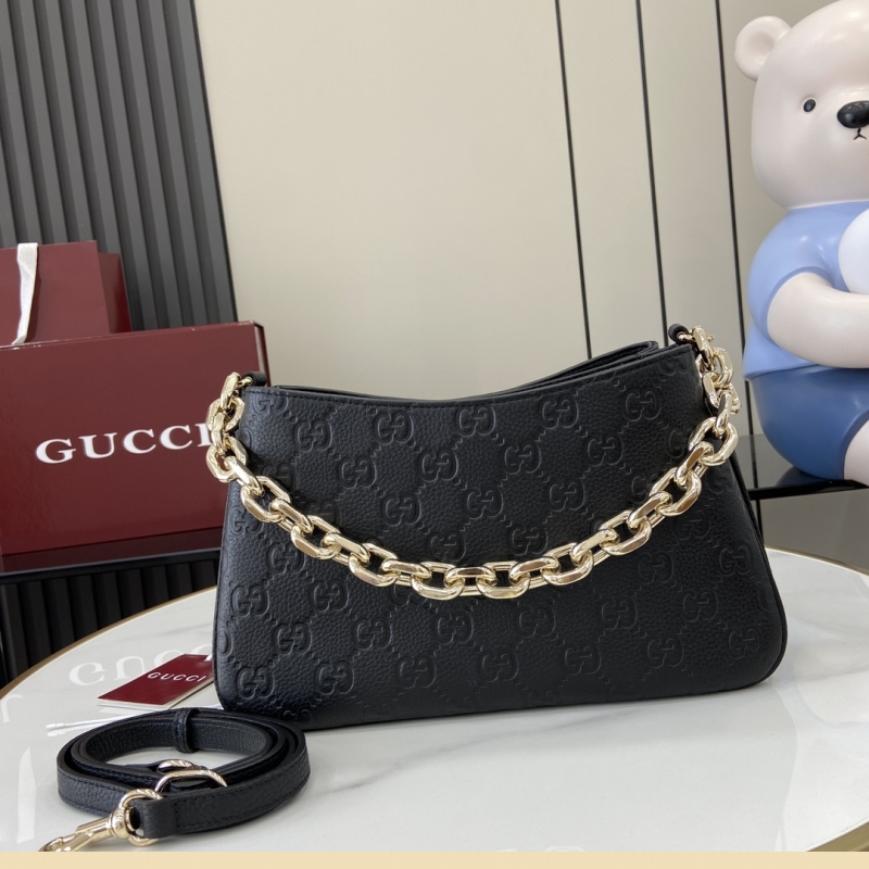 G*u*i top handle bags